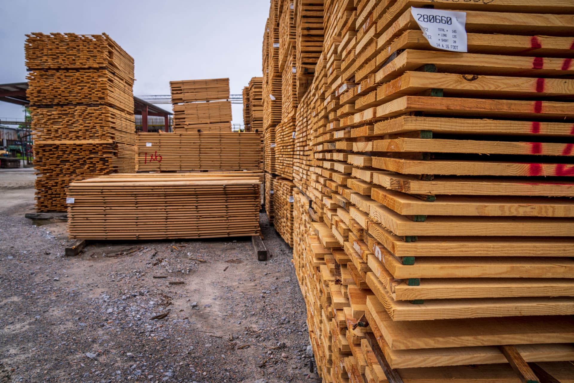 A supervisor checking inventory in a regional warehouse